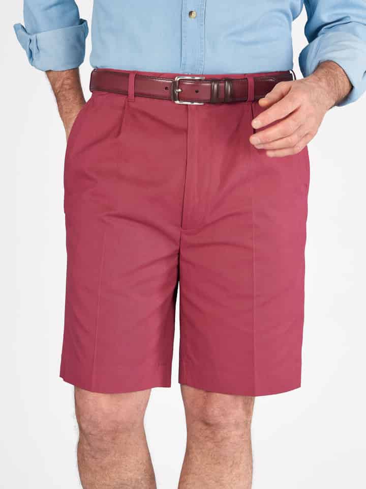 Model wears Men's Brick Red Cotton Pleated Dress Shorts