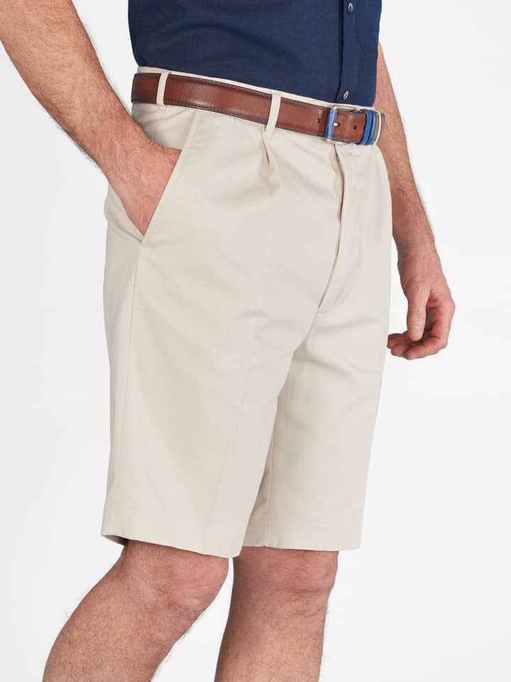 Model wears Men's Stone Beige Cotton Pleated Dress Shorts