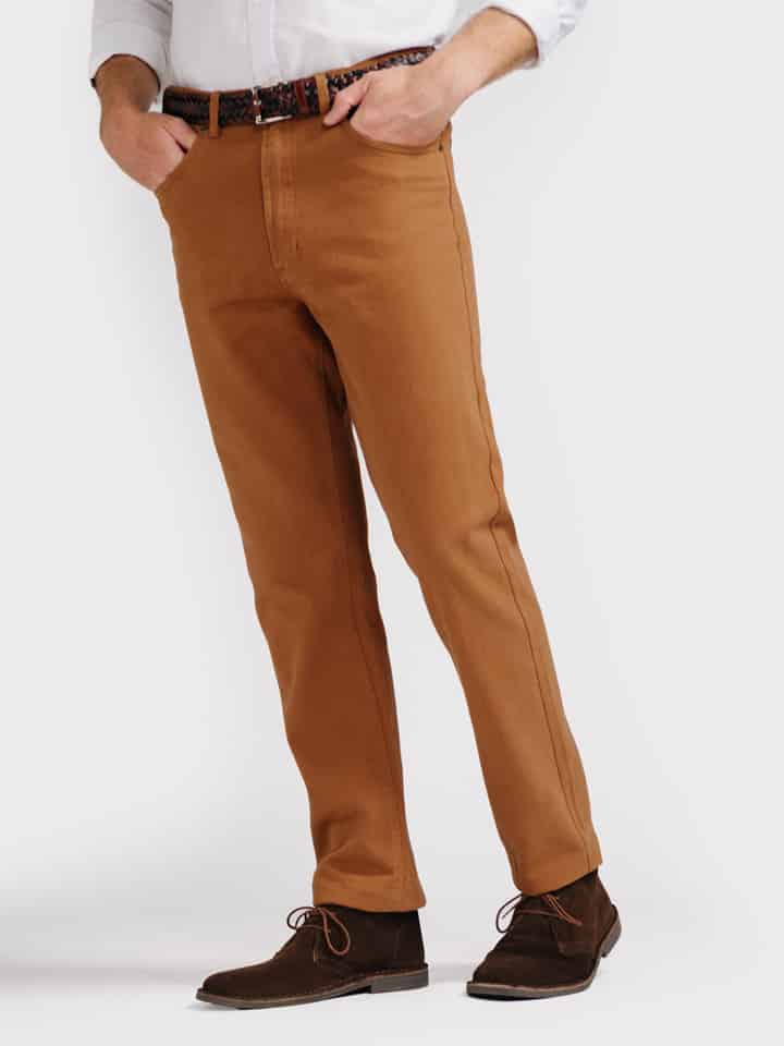 Model wears Men's Tan Brown Drill Jeans
