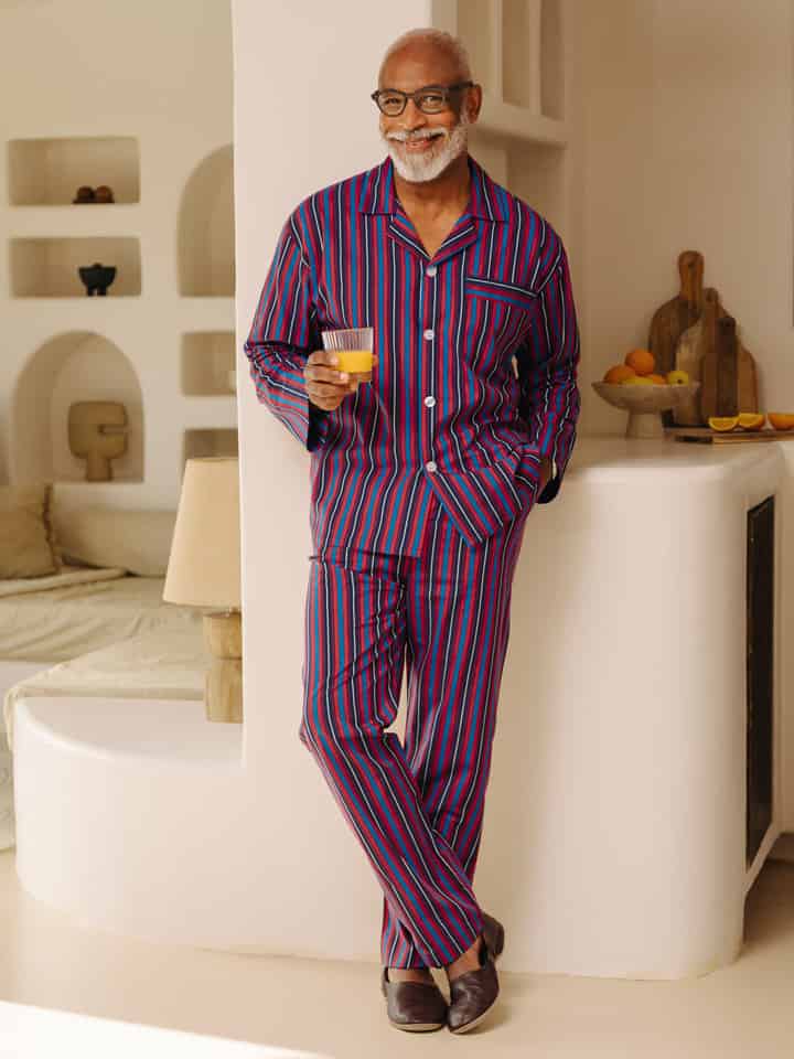 Model wears Navy & Red Cotton Club Stripe Pajamas
