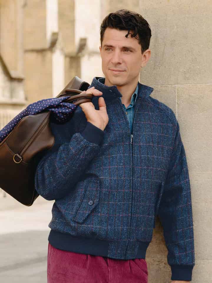 Model wears Navy Harris Tweed® Harrington Jacket Zipped Up