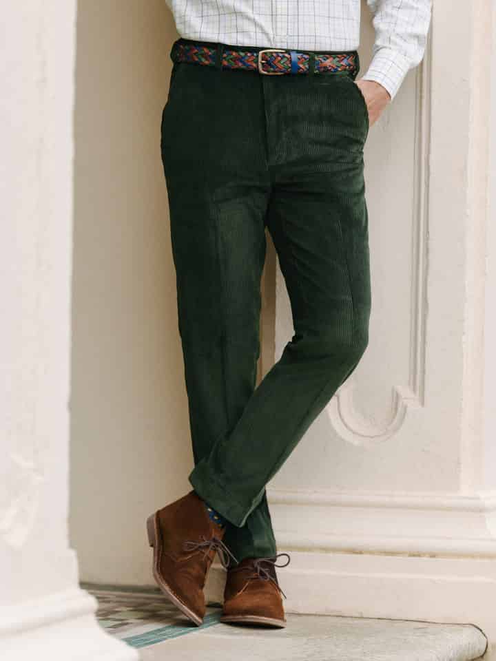 Mens Pine Green Tapered Corduroy Pants on Model Legs Closeup